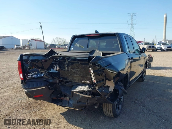 2020 Honda Ridgeline RTL with VIN 5FPYK3F52LB024816, listed as a IAAI auction lot 42103344 with 68,700 mi miles and . Bid and sale history available at DreamBid. Image 4.