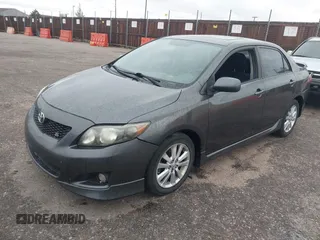 2009 Toyota Corolla with VIN 1NXBU40E99Z050218, listed as a IAAI auction lot 42208256 with 149,796 mi miles. Bid and sale history available at carsss.com. Image 2.
