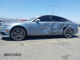 2018 Audi A7 Premium Plus z VIN WAUW3AFC1JN026763, wystawiony jako IAAI lot #42359297 z przebiegiem 108 937 mil mil oraz . Historia ofert i sprzedaży dostępna na DreamBid. Obrazek 2.