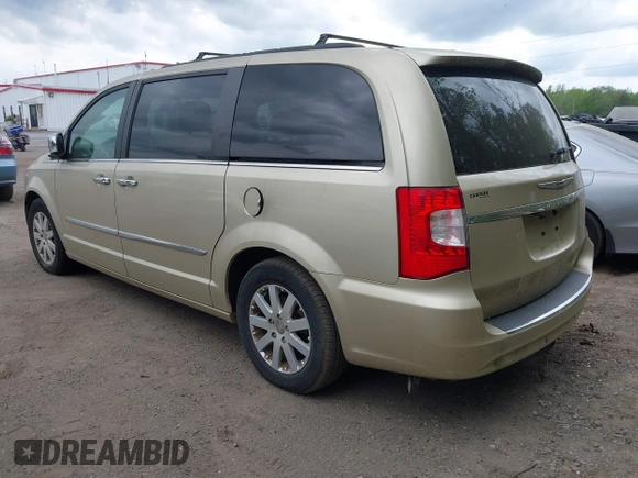 2011 Chrysler Town & Country Touring L z VIN 2A4RR8DG1BR703726, wystawiony jako IAAI lot #42134668 z przebiegiem 133 329 mil mil oraz . Historia ofert i sprzedaży dostępna na DreamBid. Obrazek 3.
