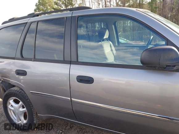 2007 GMC Envoy SLE with VIN 1GKDS13S372241844, listed as a IAAI auction lot 41575443 with 144,726 mi miles. Bid and sale history available at carsss.com. Image 13.