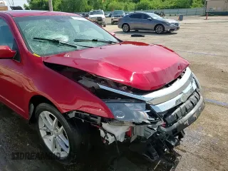 2012 Ford Fusion SEL with VIN 3FAHP0JA1CR348647, listed as a Copart auction lot 61761545 with 65,456 mi miles and Salvage title. Bid and sale history available at DreamBid. Image 13.