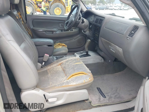 2004 Toyota Tacoma PreRunner z VIN 5TEGN92N74Z411950, wystawiony jako IAAI lot #42536808 z przebiegiem 201 453 mil mil oraz . Historia ofert i sprzedaży dostępna na DreamBid. Obrazek 5.