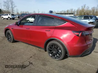 2024 Tesla Model Y Long Range with VIN 7SAYGAEEXRF056411, listed as a Copart auction lot 89218715 with Not Provided miles and Salvage Title. Bid and sale history available at DreamBid. Image 2.