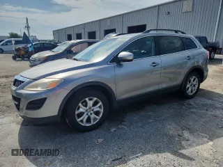 2012 Mazda CX-9 Touring with VIN JM3TB2CA2C0360941, listed as a Copart auction lot 64806985 with 240,558 mi miles and Clean title. Bid and sale history available at DreamBid. Image 1.