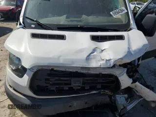 2015 Ford Transit Cargo with VIN 1FTYR2ZM0FKA99782, listed as a Copart auction lot 69564384 with Not Provided miles and Salvage Title. Bid and sale history available at carsss.com. Image 11.