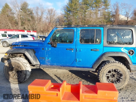 2021 Jeep Wrangler Unlimited Sport S with VIN 1C4HJXDN4MW779291, listed as a IAAI auction lot 41290109 with 43,379 mi miles and . Bid and sale history available at DreamBid. Image 14.
