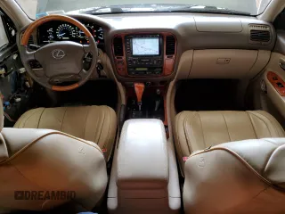 2001 Lexus LX 470 z VIN JTJHT00W113505721, wystawiony jako Copart lot #56463665 z przebiegiem 223 553 mil mil oraz Szkody całkowita. Historia ofert i sprzedaży dostępna na DreamBid. Obrazek 8.