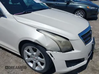 2013 Cadillac ATS with VIN 1G6AA5RX2D0150988, listed as a IAAI auction lot 42538612 with 212,037 mi miles and . Bid and sale history available at DreamBid. Image 20.