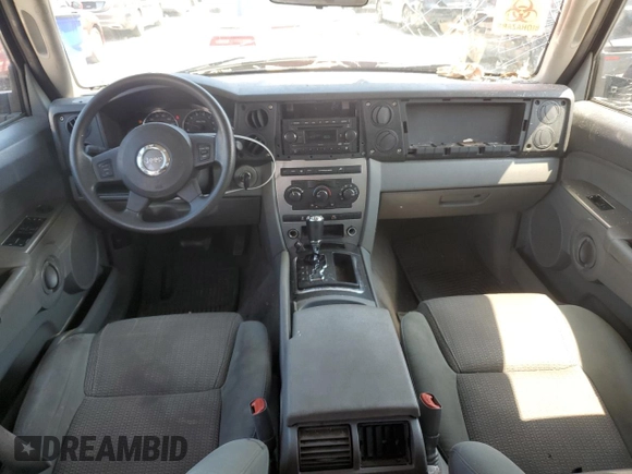 2007 Jeep Commander Sport with VIN 1J8HG48K07C684965, listed as a Copart auction lot 58061005 with 208,951 mi miles and Salvage title. Bid and sale history available at DreamBid. Image 8.
