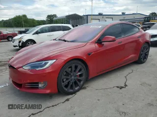 2018 Tesla Model S 75D with VIN 5YJSA1E40JF259792, listed as a Copart auction lot 56502085 with 116,821 mi miles and Salvage title. Bid and sale history available at DreamBid. Image 1.