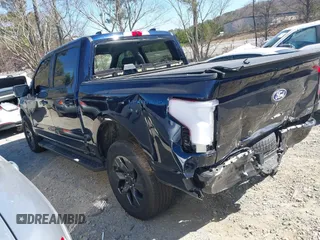 2024 Ford F-150 Lightning Flash with VIN 1FT6W3L75RWG30755, listed as a IAAI auction lot 41817158 with 1,932 mi miles and . Bid and sale history available at DreamBid. Image 3.