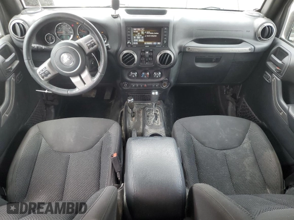 2016 Jeep Wrangler Unlimited Sport with VIN 1C4BJWDG1GL165418, listed as a Copart auction lot 61364095 with 123,772 mi miles and Salvage title. Bid and sale history available at DreamBid. Image 8.