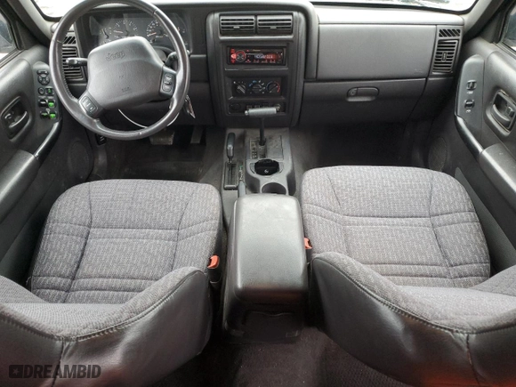 2000 Jeep Cherokee Police with VIN 1J4FF48SXYL244524, listed as a Copart auction lot 81164034 with 104,180 mi miles and Clean Title. Bid and sale history available at carsss.com. Image 8.