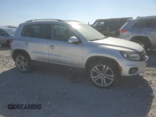 2012 Volkswagen Tiguan S with VIN WVGBV7AX5CW601352, listed as a Copart auction lot 48768155 with 161,632 mi miles and Salvage Title. Bid and sale history available at DreamBid. Image 4.
