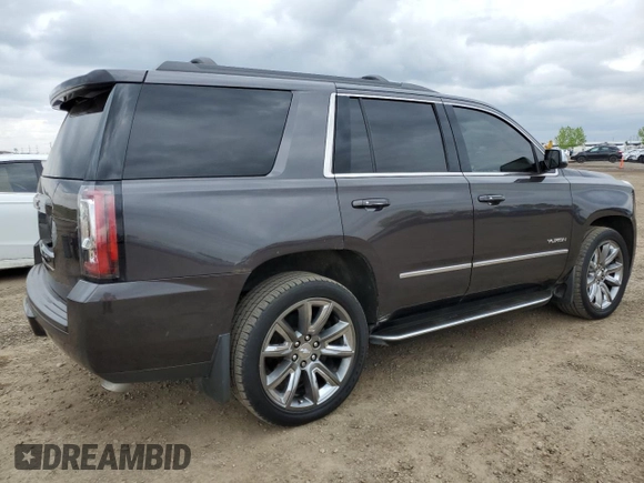 2015 GMC Yukon SLT z VIN 1GKS2BKCXFR269881, wystawiony jako Copart lot #57678175 z przebiegiem 256 703 mil mil oraz Czysty tytuł • Clean title. Historia ofert i sprzedaży dostępna na DreamBid. Obrazek 3.