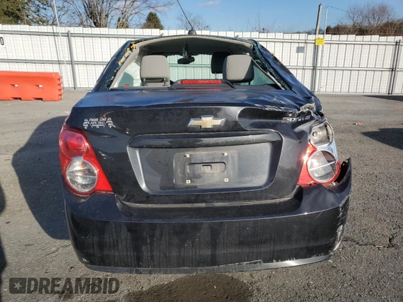 2015 Chevrolet Sonic LS z VIN 1G1JA5SG9F4128675, wystawiony jako Copart lot #88604995 z przebiegiem 124 289 mil mil oraz Szkoda całkowita • Salvage title. Historia ofert i sprzedaży dostępna na DreamBid. Obrazek 6.
