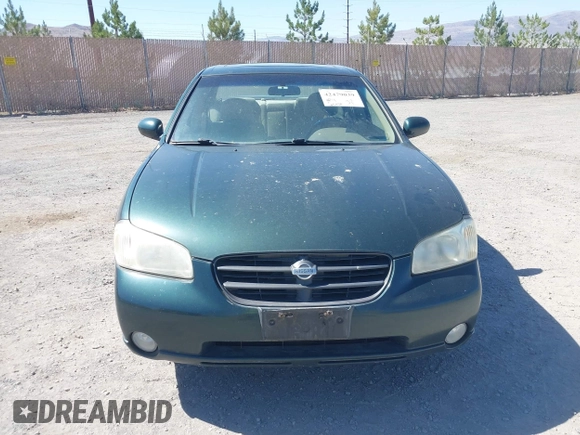 2000 Nissan Maxima GXE z VIN JN1CA31A8YT007617, wystawiony jako IAAI lot #42479039 z przebiegiem 165 950 mil mil oraz . Historia ofert i sprzedaży dostępna na DreamBid. Obrazek 6.