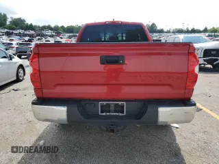 2021 Toyota Tundra SR with VIN 5TFUY5F11MX971951, listed as a Copart auction lot 64889875 with 69,297 mi miles and Salvage title. Bid and sale history available at DreamBid. Image 6.