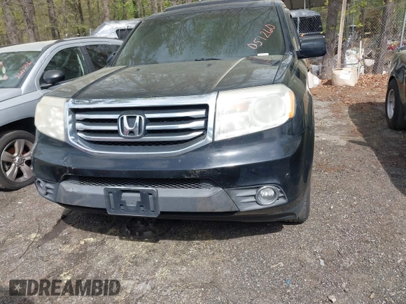 2012 Honda Pilot Touring with VIN 5FNYF4H92CB051260, listed as a IAAI auction lot 41906802 with 256,691 mi miles. Bid and sale history available at carsss.com. Image 12.