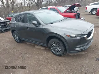 2017 Mazda CX-5 Touring with VIN JM3KFACL3H0148312, listed as a IAAI auction lot 41844634 with 68,534 mi miles and . Bid and sale history available at carsss.com. Image 1.