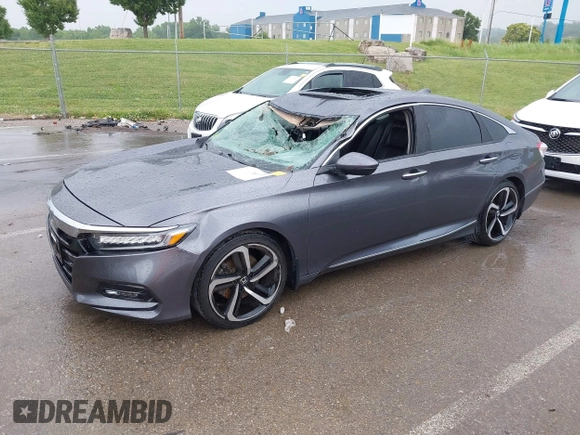 2018 Honda Accord Touring with VIN 1HGCV1F92JA005210, listed as a IAAI auction lot 42378040 with 69,294 mi miles and . Bid and sale history available at DreamBid. Image 2.