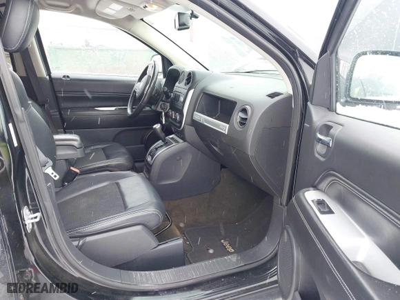 2016 Jeep Compass High Altitude Edition with VIN 1C4NJDEB8GD758174, listed as a IAAI auction lot 41235089 with 144,841 mi miles. Bid and sale history available at carsss.com. Image 5.
