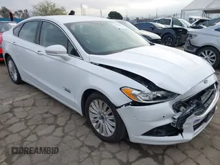 2016 Ford Fusion Energi SE Luxury with VIN 3FA6P0PU5GR366714, listed as a IAAI auction lot 41776330 with 100,195 mi miles. Bid and sale history available at carsss.com. Image 1.