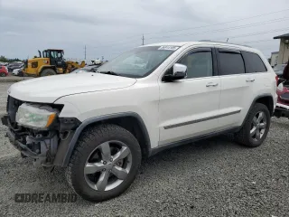 2011 Jeep Grand Cherokee Overland with VIN 1J4RR6GT9BC696319, listed as a Copart auction lot 56914185 with 211,661 mi miles and Salvage title. Bid and sale history available at DreamBid. Image 1.