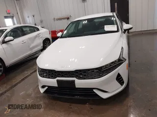 2023 Kia K5 LXS z VIN 5XXG14J2XPG189462, wystawiony jako IAAI lot #42233595 z przebiegiem 17 286 mil mil oraz . Historia ofert i sprzedaży dostępna na DreamBid. Obrazek 12.