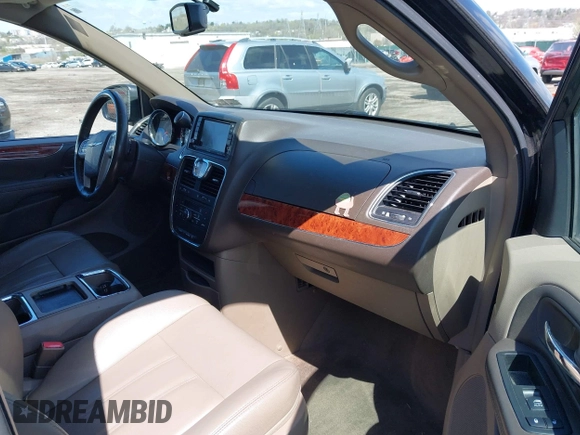 2015 Chrysler Town & Country Touring with VIN 2C4RC1BG5FR521339, listed as a IAAI auction lot 41984089 with 107,275 mi miles and . Bid and sale history available at DreamBid. Image 5.
