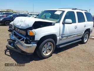 2002 GMC Yukon SLT z VIN 1GKEC13T62R189751, wystawiony jako IAAI lot #42228985 z przebiegiem 199 654 mil mil oraz . Historia ofert i sprzedaży dostępna na DreamBid. Obrazek 2.