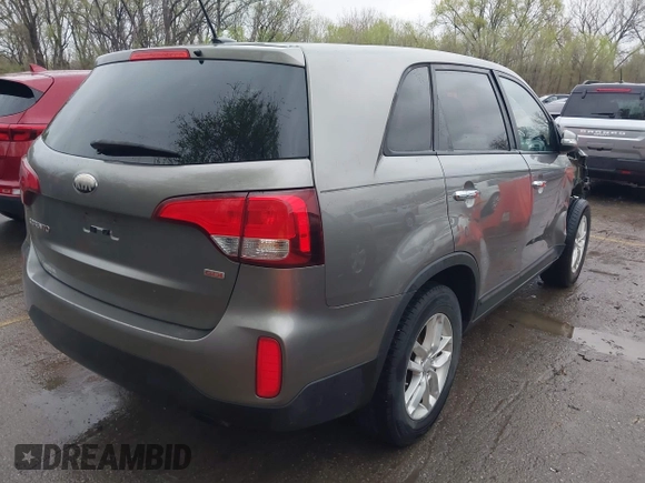 2014 Kia Sorento LX with VIN 5XYKT3A67EG477367, listed as a IAAI auction lot 41911249 with 172,320 mi miles and . Bid and sale history available at DreamBid. Image 4.