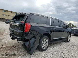 2022 GMC Yukon XL SLT with VIN 1GKS2GKD4NR236685, listed as a Copart auction lot 46396965 with 70,093 mi miles and Non Repairable. Bid and sale history available at carsss.com. Image 3.