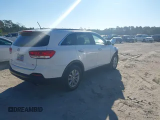 2017 Kia Sorento LX with VIN 5XYPG4A33HG255838, listed as a IAAI auction lot 41688042 with 50,187 mi miles. Bid and sale history available at carsss.com. Image 4.