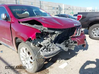 2015 Jeep Grand Cherokee Summit with VIN 1C4RJEJG9FC100568, listed as a IAAI auction lot 42512705 with 128,413 mi miles and . Bid and sale history available at DreamBid. Image 6.