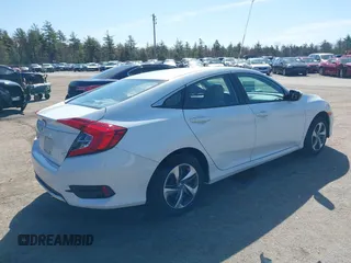 2020 Honda Civic LX with VIN 2HGFC2F64LH578421, listed as a IAAI auction lot 42103414 with 11,327 mi miles and . Bid and sale history available at DreamBid. Image 4.