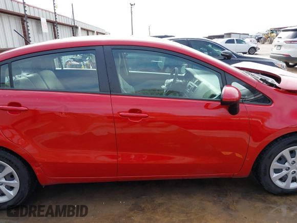 2013 Kia Rio LX with VIN KNADM4A31D6310504, listed as a IAAI auction lot 41579952 with 55,757 mi miles and . Bid and sale history available at DreamBid. Image 14.