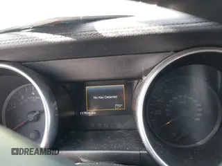 2020 Ford Mustang EcoBoost z VIN 1FATP8UHXL5186022, wystawiony jako IAAI lot #41395446 z przebiegiem 117 634 mil mil oraz . Historia ofert i sprzedaży dostępna na DreamBid. Obrazek 7.