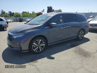 2023 Honda Odyssey Touring z VIN 5FNRL6H81PB024055, wystawiony jako Copart lot #56219925 z przebiegiem Nie podano mil oraz Szkoda całkowita • Salvage title. Historia ofert i sprzedaży dostępna na DreamBid. Obrazek 1.