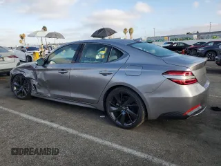 2023 Genesis G70 2.0T with VIN KMTG34TA0PU120788, listed as a Copart auction lot 68816274 with 9,481 mi miles and Salvage Title. Bid and sale history available at DreamBid. Image 2.