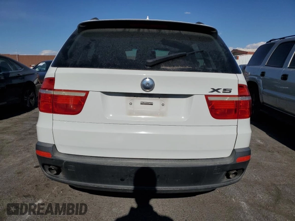 2007 BMW X5 3.0si with VIN 5UXFE43577L018075, listed as a Copart auction lot 81005304 with 128,100 mi miles and Salvage Title. Bid and sale history available at carsss.com. Image 6.