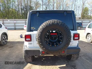 2019 Jeep Wrangler Unlimited Sahara with VIN 1C4HJXEN2KW591557, listed as a IAAI auction lot 41962034 with 88,691 mi miles and . Bid and sale history available at DreamBid. Image 16.