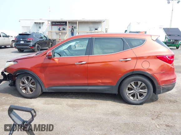 2014 Hyundai Santa Fe z VIN 5XYZTDLB0EG208769, wystawiony jako IAAI lot #42485411 z przebiegiem 82 173 mil mil oraz . Historia ofert i sprzedaży dostępna na DreamBid. Obrazek 14.