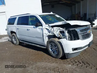 2016 Chevrolet Suburban LT with VIN 1GNSKHKCXGR206948, listed as a IAAI auction lot 41842774 with 190,935 mi miles. Bid and sale history available at carsss.com. Image 1.