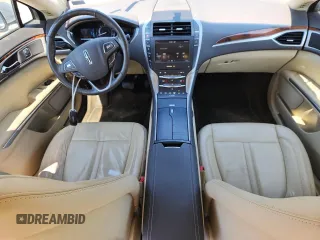 2014 Lincoln MKZ Hybrid z VIN 3LN6L2LU6ER819769, wystawiony jako Copart lot #65645965 z przebiegiem 142 623 mil mil oraz Szkoda całkowita • Salvage title. Historia ofert i sprzedaży dostępna na DreamBid. Obrazek 8.
