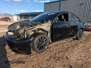 2023 Tesla Model Y Long Range z VIN 7SAYGAEE5PF711801, wystawiony jako Copart lot #55168875 z przebiegiem 46 012 mil mil oraz Szkoda całkowita • Salvage title. Historia ofert i sprzedaży dostępna na DreamBid. Obrazek 1.
