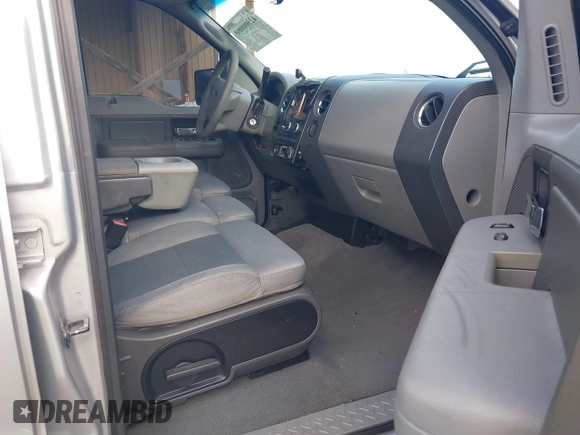 2007 Ford F-150 XLT with VIN 1FTPW12V77FB78121, listed as a IAAI auction lot 42300080 with 203,990 mi miles and . Bid and sale history available at DreamBid. Image 5.