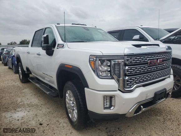2022 GMC Sierra 3500HD Denali with VIN 1GT49WEY3NF313587, listed as a Copart auction lot 77117164 with 0 mi miles and Salvage Title. Bid and sale history available at carsss.com. Image 4.