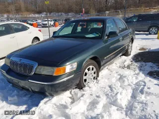 1998 Mercury Grand Marquis GS with VIN 2MEFM74W7WX648255, listed as a IAAI auction lot 41594158 with 108,527 mi miles. Bid and sale history available at carsss.com. Image 2.
